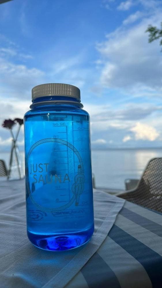 The blue Just Sauna Nalgene bottle